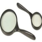 MAGNIFIER HAND